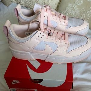Brand new, never worn women’s light soft pink Nike Dunk Low sneakers